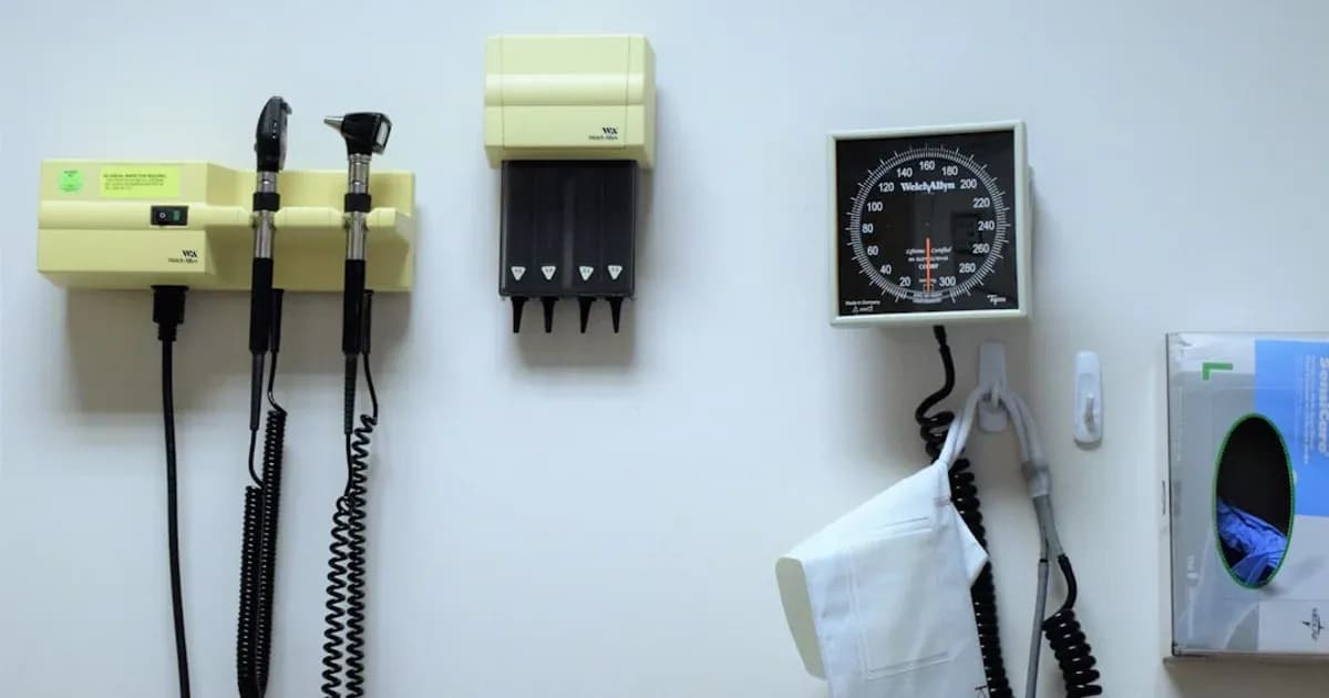 a white wall with a bunch of electrical equipment on it