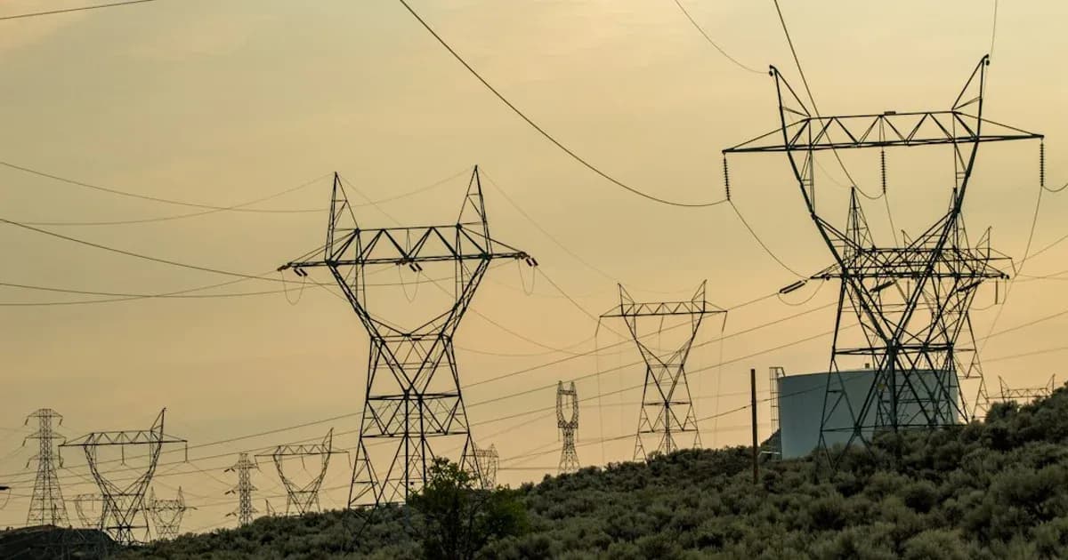 silhouette of electric utility post