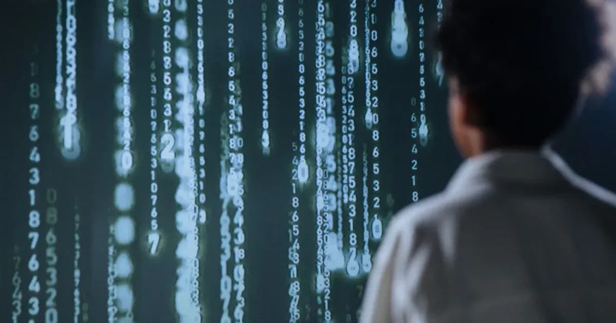 An individual viewing glowing numbers on a screen, symbolizing technology and data.