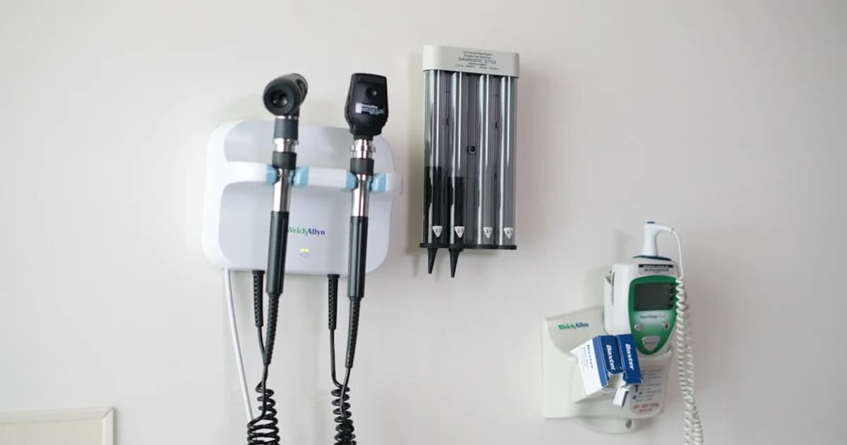 Medical diagnostic tools mounted on a wall.